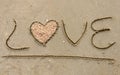 Love written on sandy beach Royalty Free Stock Photo