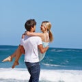 Love you forever and always. a happy young couple enjoying a romantic day on the beach. Royalty Free Stock Photo