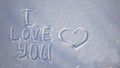 Love you lettering in the snow. Valentine's Day. Royalty Free Stock Photo