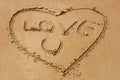 Love you on sandy beach Royalty Free Stock Photo