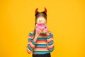 Love you. Small child cover face with teddy bear toy. Little girl in red devil horns hold valentines toy. Plaything. Toy Royalty Free Stock Photo