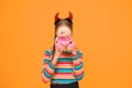 Love you. Small child cover face with teddy bear toy. Little girl in red devil horns hold valentines toy. Plaything. Toy Royalty Free Stock Photo