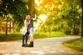 Love young couple on rollerblades Royalty Free Stock Photo