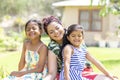 Love between a young mother and her two pretty daughters Royalty Free Stock Photo