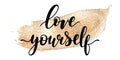 Love yourself - black hand written lettering with golden smear isolated on white background.