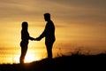 Loveing couple in sunset time Royalty Free Stock Photo