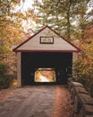Lovejoy Bridge and autumn color, in Andover, Maine Royalty Free Stock Photo