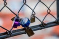 Lovelocks: The romantic tradition of sweethearts locking padlocks to a fence on a bridge, symbolizing their enduring love for each