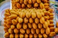 Lovelorn fruit for sell on longtail boat at Damnoen Saduak Floating Market near Bangkok in Thailand Royalty Free Stock Photo