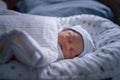 Lovely Asian baby infant sleeping on soft bed. portrait of newborn child. Royalty Free Stock Photo