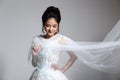 Lovely Asian Beautiful Woman bride in white wedding gown dress w Royalty Free Stock Photo