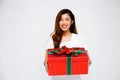 Cheerful Asian woman with present