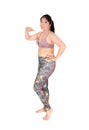 Lovely Asian woman standing in sports bra and leggings Royalty Free Stock Photo