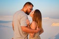 Lovely attractive couple kissing on the white sand beach or in t Royalty Free Stock Photo