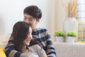 Lovely attractive young Asian smile couple man and woman with happy kiss and hug in romantic moment. Warm heart marriage and lover