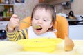 Lovely baby eating soup Royalty Free Stock Photo