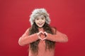 Lovely baby. Feeling warm. Child long hair soft hat. Winter fashion concept. Warm hat for cold winter weather. Kid girl