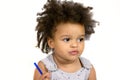 Lovely baby holding blue pen Royalty Free Stock Photo