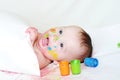 Lovely baby with paper and finger-type paints Royalty Free Stock Photo