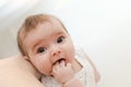 Lovely baby sucking hand Royalty Free Stock Photo