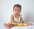 Lovely baby and toy guitar Royalty Free Stock Photo