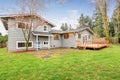 Lovely back yard with deck and grass. Royalty Free Stock Photo