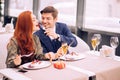 Lovely beautiful couple in restaurant Royalty Free Stock Photo