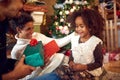 Lovely black child for Christmas with parents