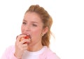 Lovely Blond Girl Eating An Apple Royalty Free Stock Photo