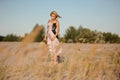 Lovely blonde girl in a lingerie on the field Royalty Free Stock Photo