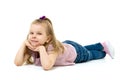 Lovely blonde little girl lying on the floor Royalty Free Stock Photo