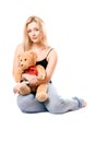 Lovely blonde with a teddy bear Royalty Free Stock Photo