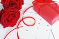 Lovely blooming red color rose flower and elegant gift box on 14 Fab calender background decorated with red ribbon, sweet Royalty Free Stock Photo