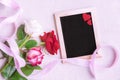 Roses and chalkboard with red hearts Royalty Free Stock Photo