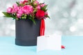 Lovely bouquet of pink and red roses with a blank gift tag with Royalty Free Stock Photo