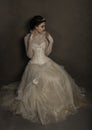 Lovely bride wearing vintage wedding gown and tiara