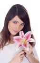 Lovely brunette with flower in hands Royalty Free Stock Photo