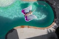 A Lovely Brunette Swimsuit Model Enjoys Her Holiday At The Pool Royalty Free Stock Photo