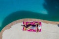 A Lovely Brunette Swimsuit Model Enjoys Her Holiday At The Pool Royalty Free Stock Photo