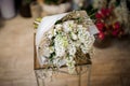 Lovely bunch of white flowers on glass stool