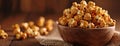 lovely caramel popcorn presented in a rustic wooden bowl atop a burlap napkin, against the backdrop of a dark wood