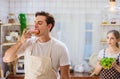 Lovely caucasian couple or lover in kitchen together