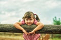 Lovely cheerful little girl on a walk