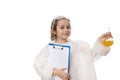 Lovely child girl in lab coat with clipboard, showing camera a laboratory flask with liquid chemical at chemistry class