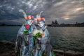 Lovely colored couple at sunset during venice carnival Royalty Free Stock Photo