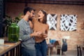 Lovely couple in the bar enjoying their time and laughing. Daytime in the cafe Royalty Free Stock Photo