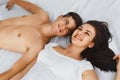 Lovely couple on bed Royalty Free Stock Photo