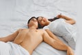 Lovely couple on bed Royalty Free Stock Photo