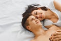 Lovely couple on bed Royalty Free Stock Photo