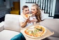 Lovely Couple Enjoying Pizza